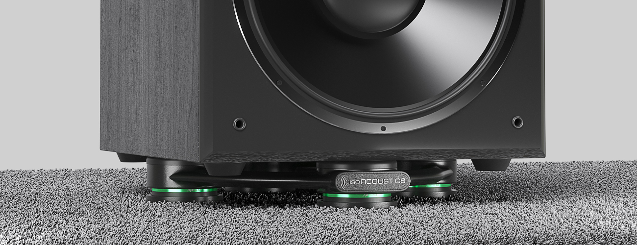 IsoAcoustics Aperta Sub configured with included carpet discs high-shag rug
