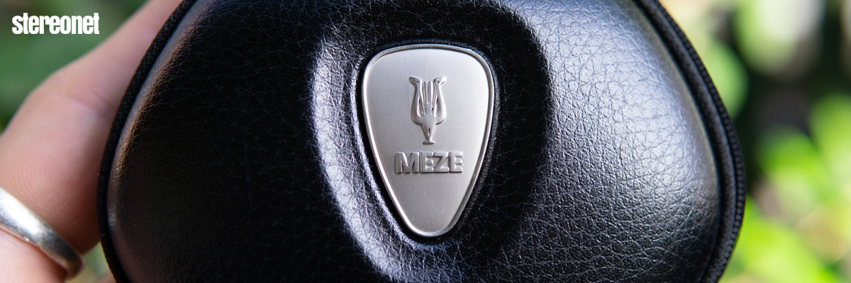 Meze's RAI Solo in-ears, concealed in their included rugged carry case accessory